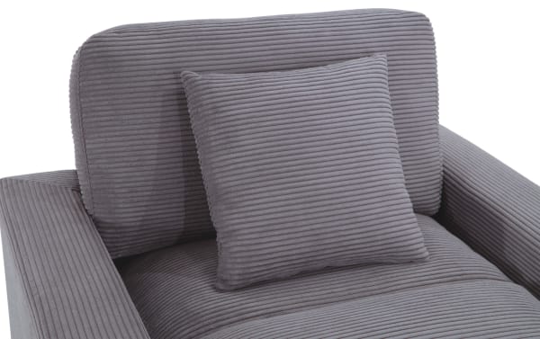 Charcoal gray Aspen Charcoal Chaise with plush polyester fabric upholstery, ribbed texture, and matching accent pillow from the Aspen collection.