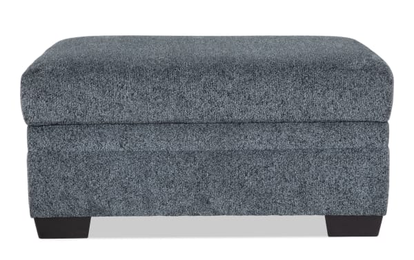 Hannah Gray Storage Ottoman in gray plush polyester fabric with cushion foam, transitional style, and hidden storage compartment.