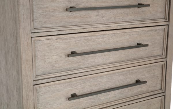 Artisan Gray 5 Drawer Chest in oak with a transitional style, featuring long metal handles and detailed wood grain from the Artisan Bedroom collection.