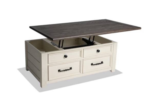 Laurel White & Brown Lift-Top Storage Coffee Table from Laurel Entertainment & Occasional, cottage style with MDF, rubberwood, acacia veneers, two-tone distressed top, dark hardware, hidden lift-top storage, two drawers, and casters for easy mobility.