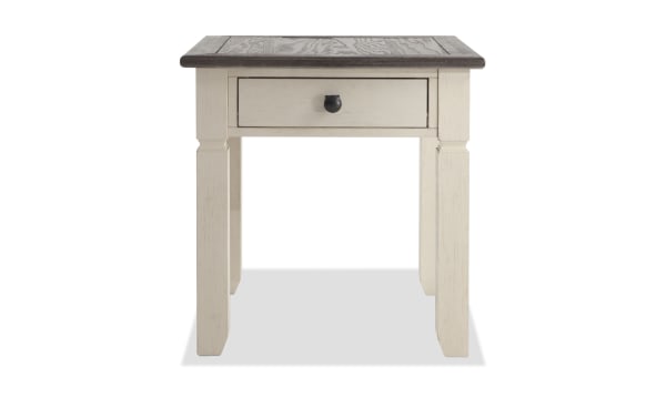 Laurel White & Brown Storage End Table in cottage style with two-tone MDF, rubberwood, and acacia veneer, featuring a distressed top and storage drawer.
