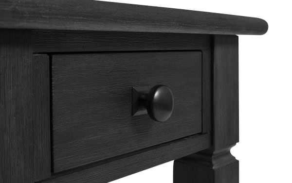 Rustic Laurel Charcoal Storage Chairside Table drawer with black knob, featuring distressed MDF, rubberwood solids, and acacia veneers.