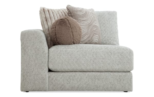 Posh Beige Left Arm Facing Chair with plush beige polyester fabric upholstery, transitional style, gel-infused memory foam cushion, and four decorative accent pillows.