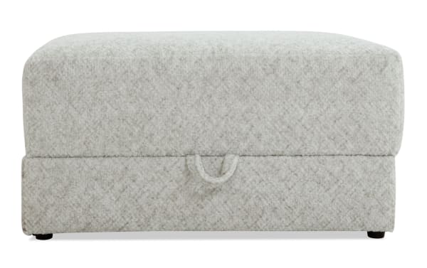 Posh Beige Storage Ottoman with plush polyester fabric upholstery, transitional style, and gel-infused memory foam for living room seating and storage.