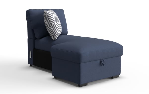 Navy blue fabric chaise lounge with cushioned backrest, geometric patterned throw pillow, and storage ottoman, modern living room furniture.