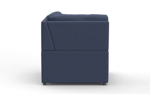 Navy blue fabric upholstered sofa side view showing clean lines, cushioned armrest, and modern block-style design.