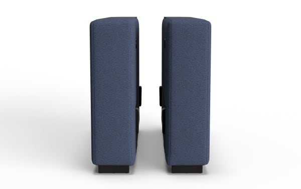 Two blue fabric-covered rectangular cushions with black wooden bases, shown from the side, highlighting their thickness and texture.