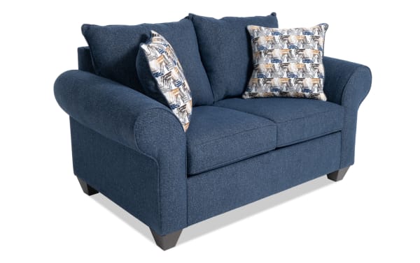 Kylie Navy 70'' Loveseat with plush navy polyester fabric, transitional style, rolled arms, memory foam cushions, and patterned accent pillows.