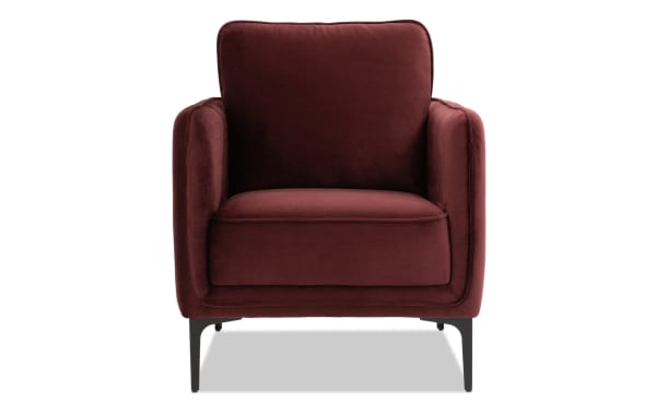 Madeline Berry Accent Chair in plush berry velvet fabric with cushy foam cushions, slope arms, and sleek black metal legs, contemporary style.