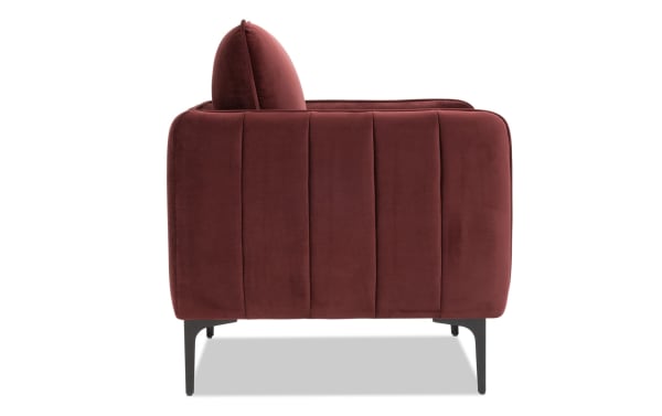 Contemporary Madeline Berry Accent Chair in plush berry velvet fabric with cushy foam cushions, slope arms, and slender black metal legs.