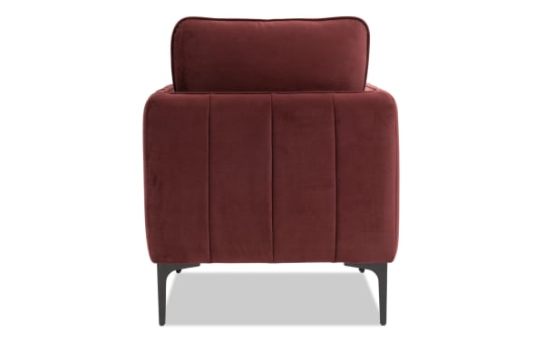 Contemporary Madeline Berry Accent Chair in plush berry velvet fabric with cushy foam cushions, slope arms, and sleek black metal legs.
