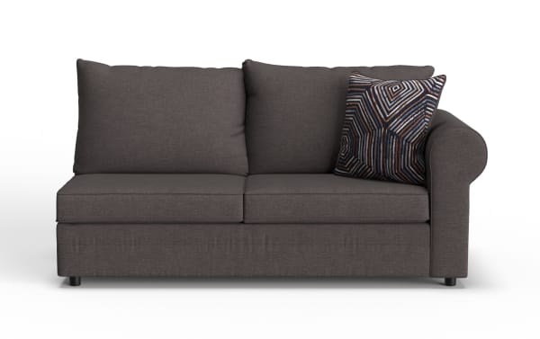 Dark gray fabric loveseat sofa with two large back cushions, one patterned decorative pillow, and rounded armrest on the right side.