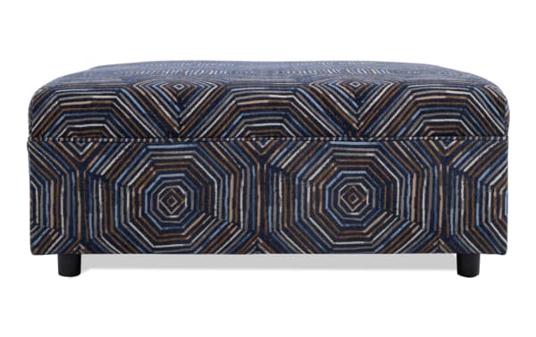 Juno Multicolored Ottoman with transitional style, cushioned polyester fabric upholstery in geometric pattern, perfect for living room seating or footrest.