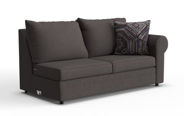 Dark gray fabric loveseat sofa with two large back cushions and one decorative geometric patterned throw pillow, modern design.