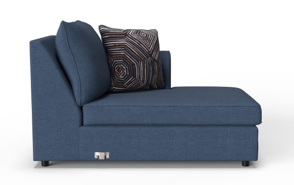 Modern blue fabric chaise lounge with plush cushions and a decorative geometric-patterned throw pillow, ideal for living room seating.