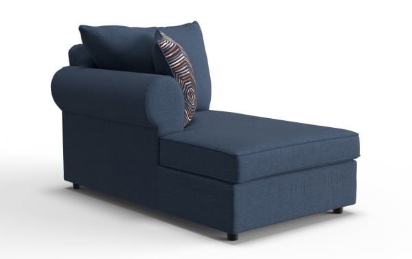 Modern navy blue fabric chaise lounge with rolled armrest, plush cushions, and a decorative patterned throw pillow, ideal for living room seating.