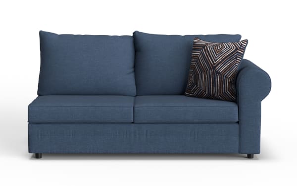 Blue fabric loveseat sofa with two large back cushions, a geometric patterned accent pillow, and rounded armrest on the right side.