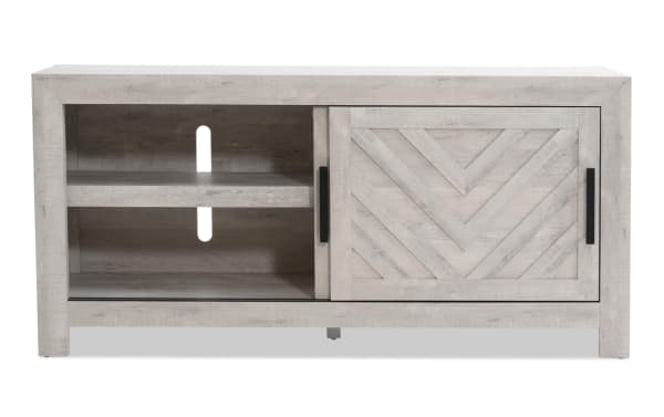 Calvin 55'' White TV Stand from Calvin Entertainment & Occasional collection, MDF transitional style with chevron plank design, sliding doors, adjustable shelves, and cord management.