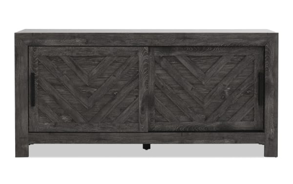 Calvin 55'' Gray TV Stand from Calvin Entertainment & Occasional collection, transitional style MDF with chevron plank design, sliding doors, and wood grain texture.