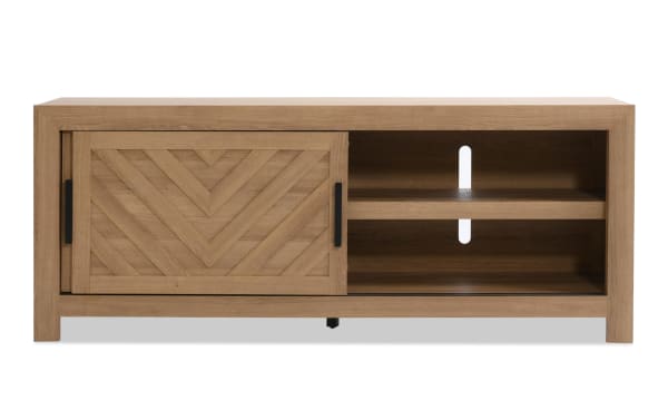Calvin 65'' Light Brown TV Stand from Calvin Entertainment & Occasional collection, transitional style MDF with chevron plank design, sliding door, adjustable shelves, and cord management.
