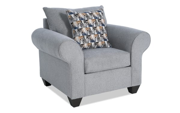 Kylie Gray Chair in transitional style with gray polyester fabric upholstery, rolled arms, Bob-O-Pedic memory foam, no-sag springs, and patterned accent pillow.