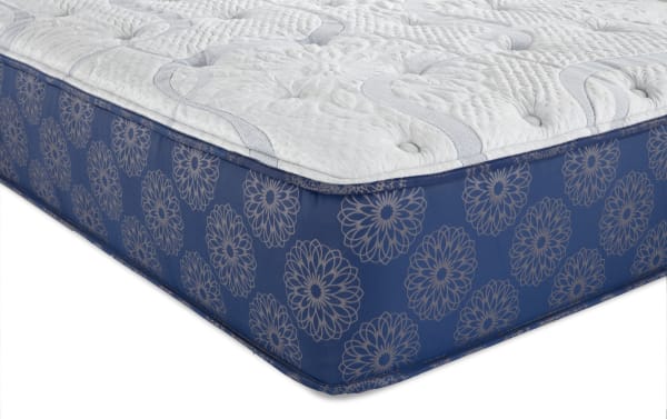 Indulgence 15'' Queen Ultra Plush Mattress with white quilted top and blue floral-patterned sides, featuring gel-infused foam and memory foam layers for pressure relief and temperature regulation.