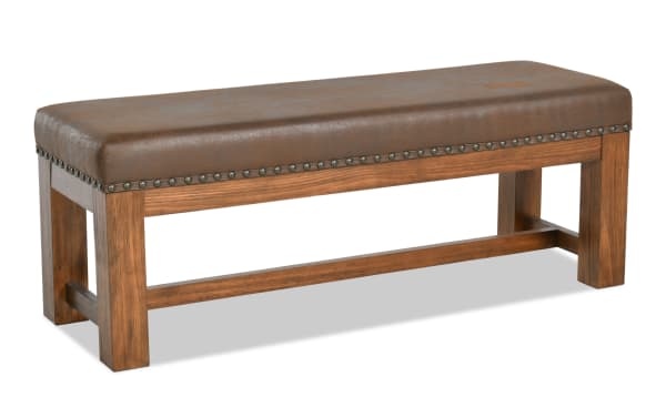 Rustic Tahoe Brown Upholstered Bench with solid pine frame, brown faux leather seat, and decorative nailhead trim from Tahoe Bedroom collection.
