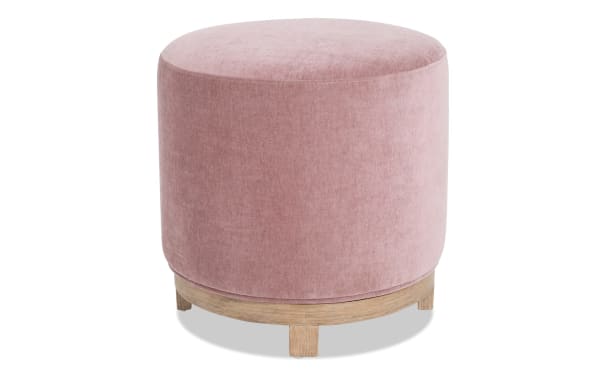 Eden Petal Swivel Ottoman in pink plush polyester fabric with 360-degree swivel, transitional style, and wooden base with short legs.