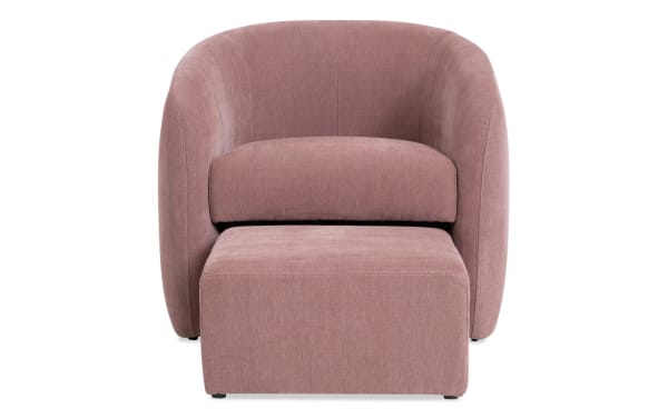 Transitional Gemma Blush Accent Chair & Ottoman set in plush blush pink polyester fabric with memory foam cushioning and rounded bucket design.