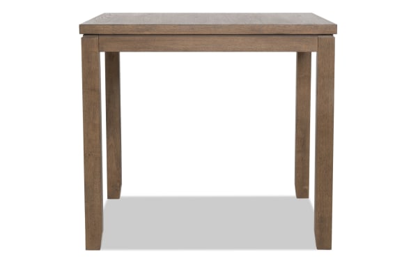 Brookline Brown counter height square dining table in transitional style, made of solid acacia, rubberwood, MDF, and oak veneers.