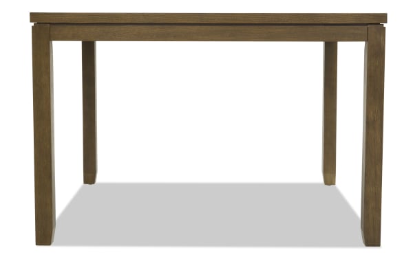 Rectangular wooden dining table with a warm brown finish, sturdy square legs, and a simple, classic design suitable for kitchen or dining room.