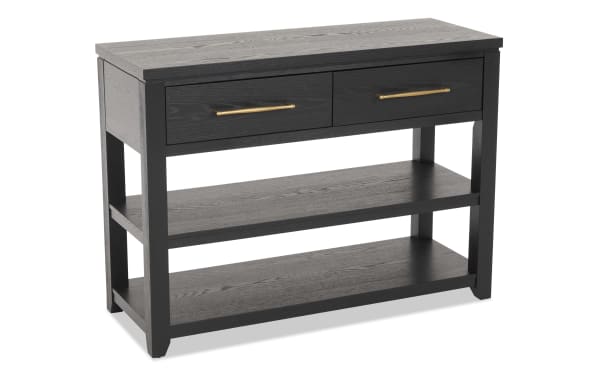 Dark wood console table with two drawers featuring gold handles, and two open shelves for storage, modern style furniture.