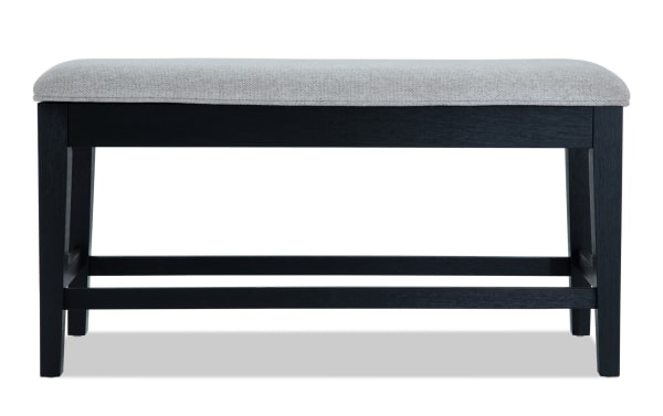 Brookline Black & White Upholstered Counter Height Storage Dining Bench with white polyester fabric seat, black wood frame, transitional style, and hidden storage.