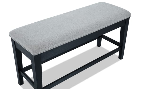 Brookline Black & White Upholstered Counter Height Storage Dining Bench with white polyester fabric seat, black solid wood frame, transitional style, and hidden storage.