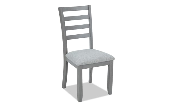 Homeworks Gray Ladder Back Upholstered Dining Chair with cushioned Bob-O-Pedic Memory Foam seat, durable wood frame, and polyester fabric upholstery in transitional style.