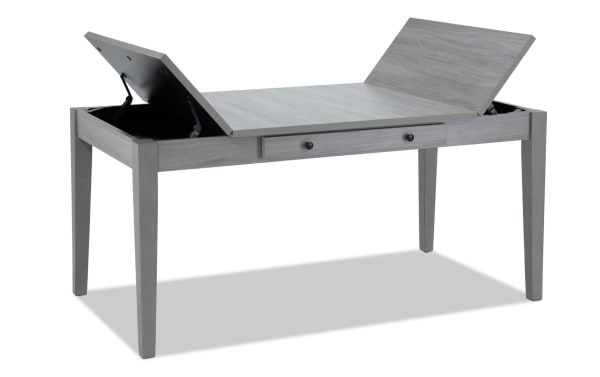 Homeworks Gray Lift-Top Storage Dining Table with transitional style, gray melamine finish, rubberwood frame, and dual lift-top compartments for hidden storage.