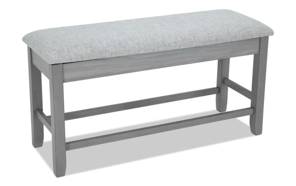 Homeworks Gray Upholstered Counter Height Dining Bench with soft polyester cushion, gray wood frame, and lift-top storage in transitional style.