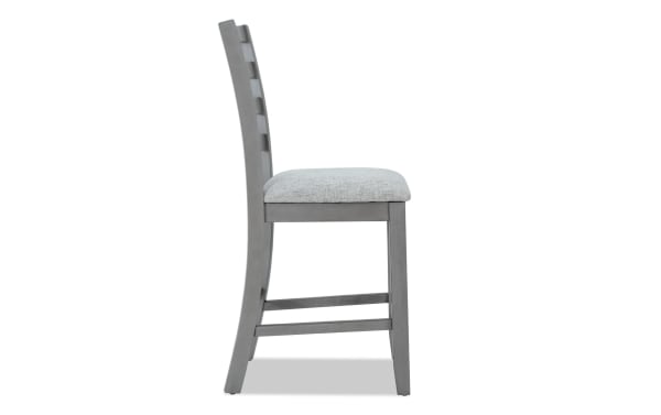Homeworks Gray Ladder Back Counter Height Stool with cushioned Bob-O-Pedic Memory Foam polyester seat, durable gray wooden frame, transitional style.