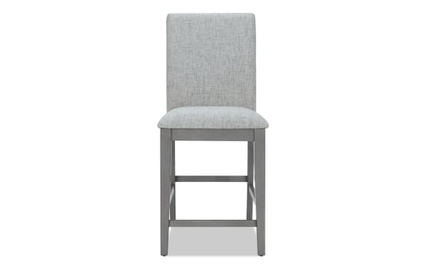 Homeworks Gray Solid Back Upholstered Counter Height Stool with cushioned Bob-O-Pedic Memory Foam seat, gray polyester fabric, and durable wooden frame in transitional style.