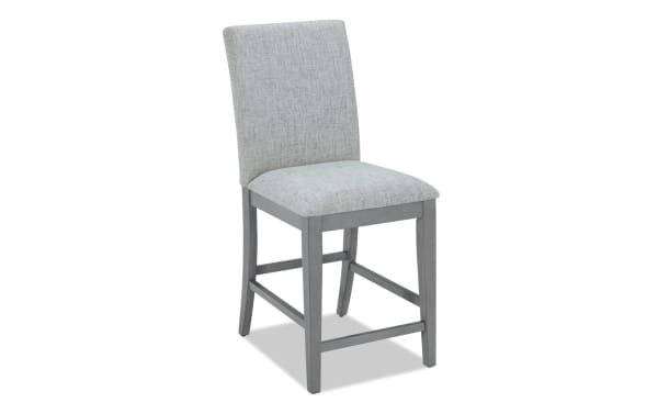 Homeworks Gray Solid Back Upholstered Counter Height Stool with gray polyester fabric, memory foam seat, and durable wooden frame in transitional style.
