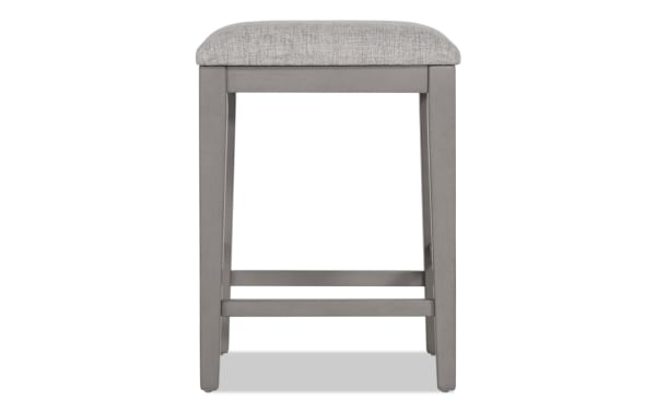 Homeworks Gray Backless Upholstered Counter Height Stool with cushioned polyester fabric seat, wooden frame, and transitional style from Homeworks Dining collection.