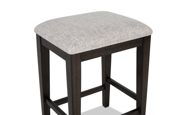 Homeworks Dark Brown & Gray backless counter stool with cushioned gray polyester fabric seat, wooden frame, and transitional style for dining.