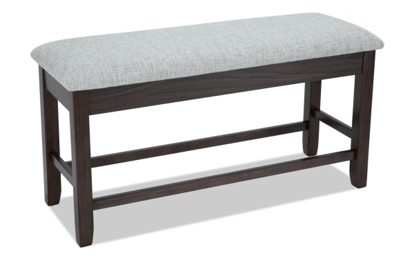 Homeworks Dark Brown & Gray Upholstered Counter Height Dining Bench with soft gray polyester seat, dark wood frame, and lift-top storage.