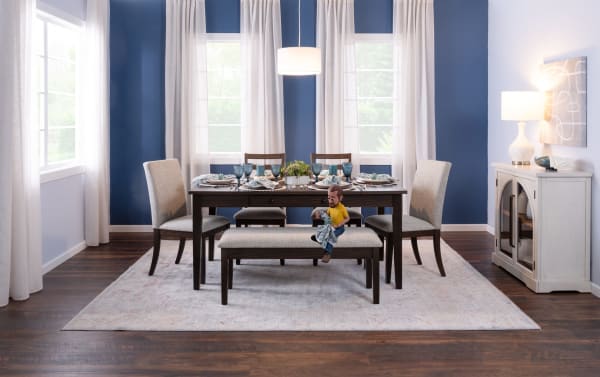 Dark brown and gray upholstered counter height stool from Homeworks Dining collection, featuring a cushioned polyester fabric seat with Bob-O-Pedic memory foam and a durable wooden frame in transitional style.