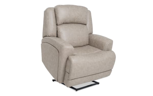 Beige Zeus Living traditional power lift recliner with fabric polyester upholstery, padded arms, power headrest, massage, heat, and lumbar support.