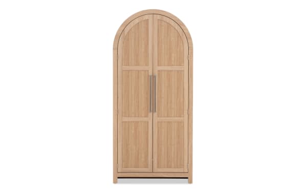 Tall wooden arched cabinet with double doors, vertical slat design, natural light wood finish, and metal handles for storage.