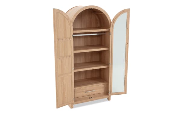 Wooden arched wardrobe with natural oak finish, featuring open double doors, three shelves, a hanging rod, a bottom drawer, and a full-length mirror on the right door.