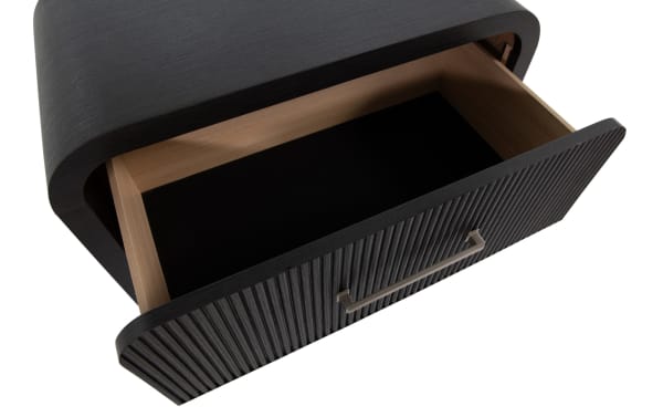 Cascade Black 3 Drawer Chest with intricate reeded drawer fronts, smooth rounded corners, and black engineered wood grain finish, transitional style.