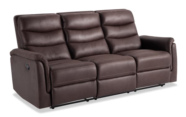 Forte Chocolate 82'' manual reclining sofa in brown polyester fabric with padded arms, memory foam seating, and contrasting stitch detail, transitional style.