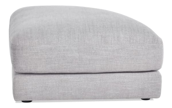 Gravity Gray Curved Ottoman in contemporary style, gray polyester fabric upholstery with plush Bob-O-Pedic® topper, part of Gravity collection.